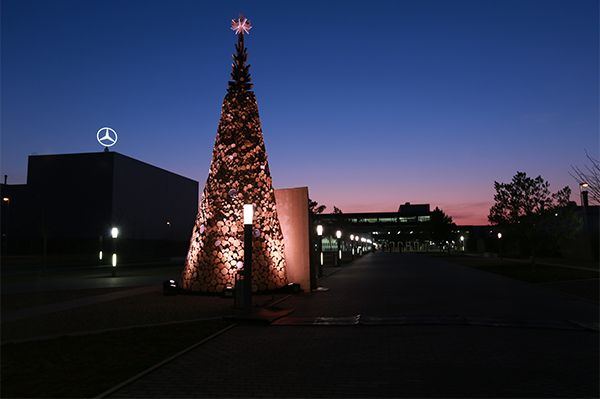 A DONATION TREE BUILT FROM FIREWOOD AT THE MERCEDES-BENZ PLANT